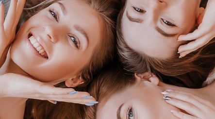 Joyful women relaxing at Casa de luxe, Los Angeles, California, US, showcasing beauty and wellness.