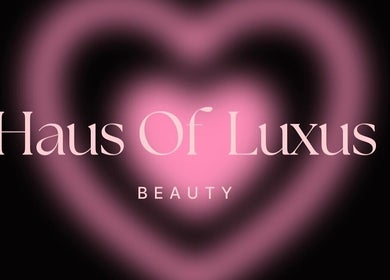 Elegant pink heart with 'Haus of Luxus Beauty' text, representing Casa de Luxe Bakersfield, in Bakersfield, California, US.