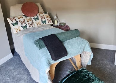 Comfortable massage table at Healing Hands with Alli, Grantham, England, GB, offering a calming retreat.