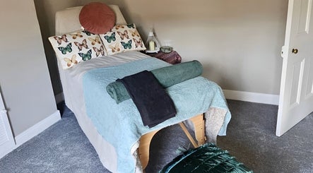 Comfortable massage table at Healing Hands with Alli, Grantham, England, GB, offering a calming retreat.