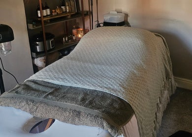 Massage table at Healing Hands with Alli in Grantham, England. Inviting wellness atmosphere.