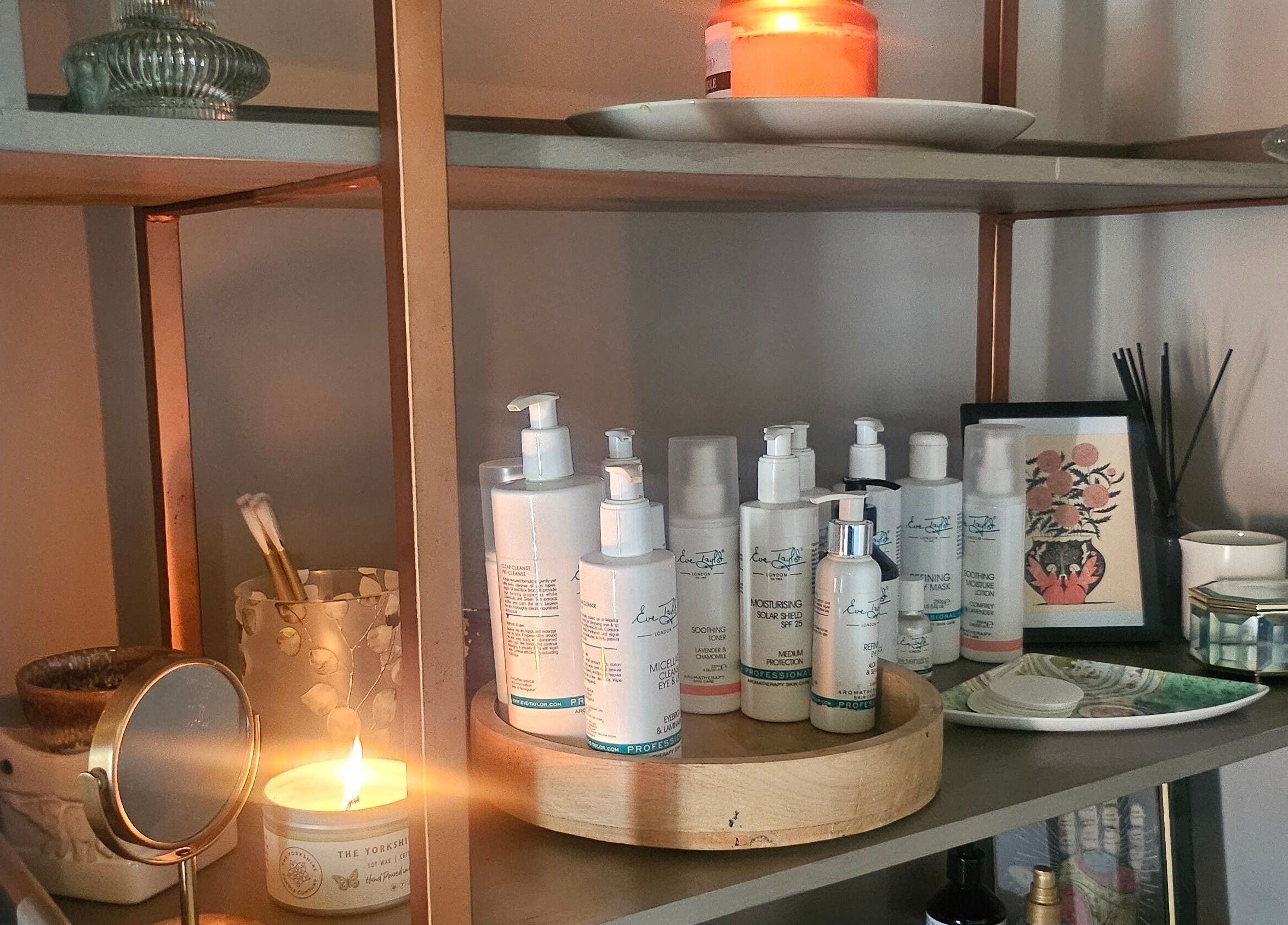 Wellness products on a shelf at Healing Hands with Alli, Grantham, England, GB, creating a tranquil atmosphere.