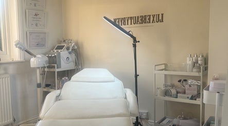 Luxebeautybyem's serene treatment room in Manchester, England, GB, featuring professional equipment.