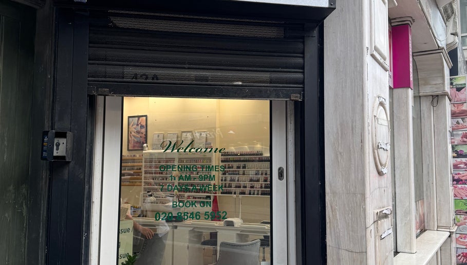 Entrance of Thai Yoga Massage Kingston with hours displayed, in Kingston Upon Thames, England, GB.