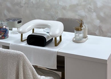 Elegant nail station setup at By Nicole Victoria, Whitworth, England, GB, featuring a manicure chair and tools.