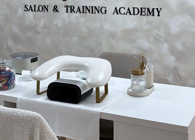 Relaxing salon setup at By Nicole Victoria, Whitworth, England, GB with sleek manicure table and tools.