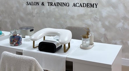 Relaxing salon setup at By Nicole Victoria, Whitworth, England, GB with sleek manicure table and tools.