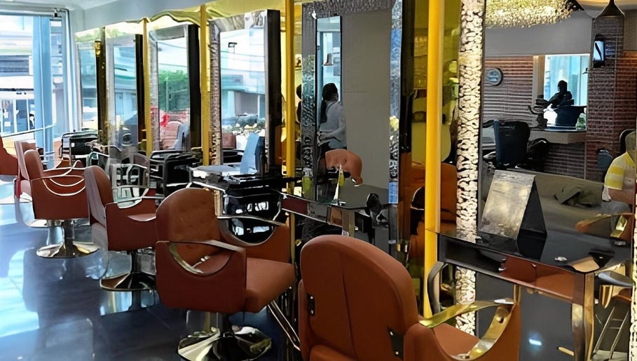 Stylish salon interior at Hair House Salon Luxury, Lipa City, Calabarzon, PH with modern chairs and mirrors.