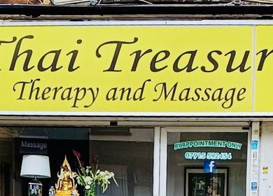 Welcome to Watsana D Thai Massage - Watford, England, GB. Bright signage highlights Thai Treasure Therapy.