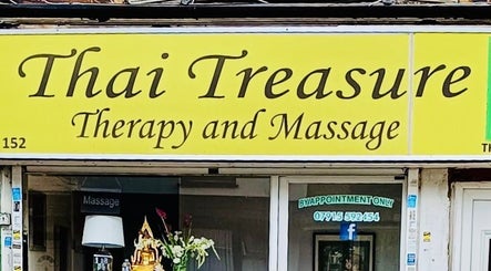 Welcome to Watsana D Thai Massage - Watford, England, GB. Bright signage highlights Thai Treasure Therapy.