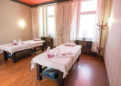 Relaxing massage room at Thai Massage Narodni, Hlavní Město Praha, CZ with twin massage tables and calming decor.