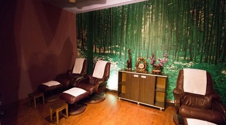Relaxing massage chairs at Thai Massage Narodni, Hlavní Město Praha, Hlavní Město Praha, CZ with forest decor.