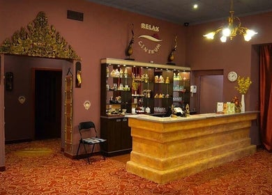 Reception area of Thai Massage Narodni in Hlavní Město Praha, CZ with ornate decor and warm lighting.