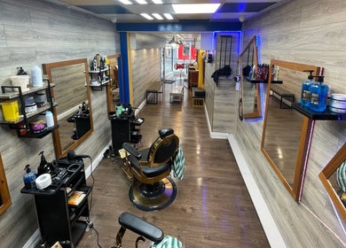 Stylish interior of Men’s Salon Boser Barber, Mullingar, County Westmeath, IE, showcasing elegant grooming stations.