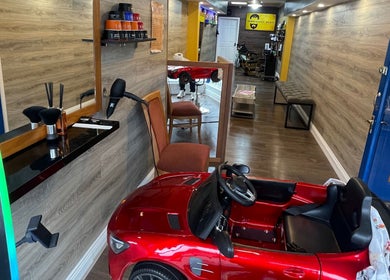 Modern interior of Men’s Salon Boser Barber in Mullingar, County Westmeath, IE, with sleek decor and styling stations.