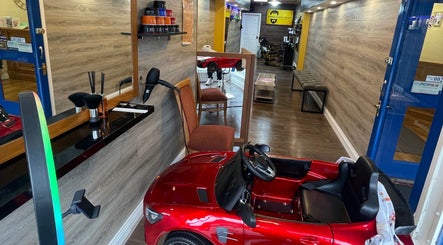 Modern interior of Men’s Salon Boser Barber in Mullingar, County Westmeath, IE, with sleek decor and styling stations.