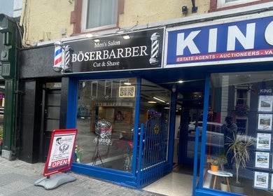 Exterior of Men’s Salon Boser Barber in Mullingar, County Westmeath, IE, featuring a classic barbershop sign.