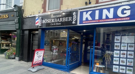 Exterior of Men’s Salon Boser Barber in Mullingar, County Westmeath, IE, featuring a classic barbershop sign.