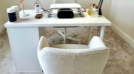 Elegant nail station at ZB NAILSTUDIO, Galway, County Galway, IE with modern decor and luxurious seating.