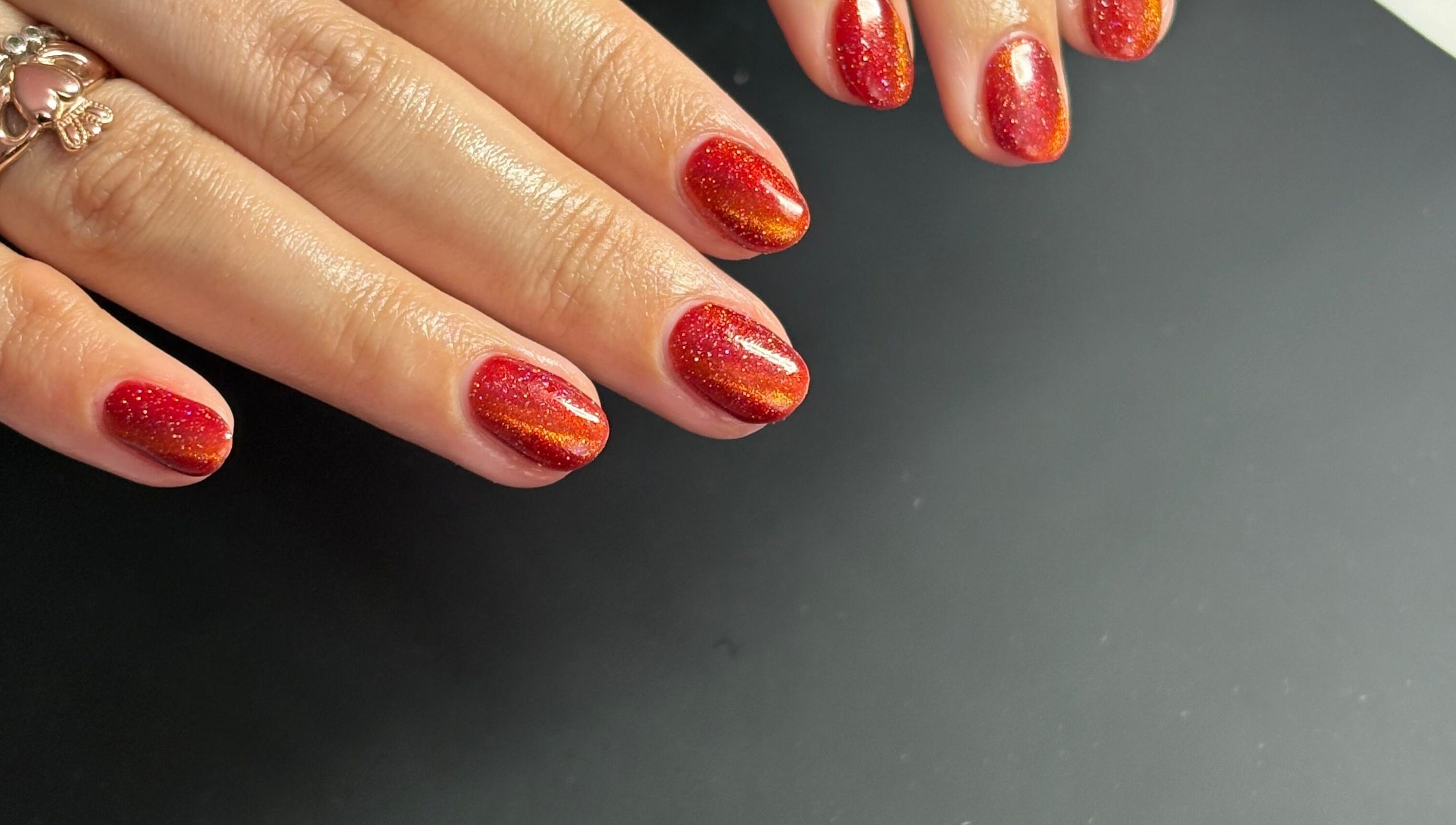Elegant red and orange glitter nails by Beck’s Nails - Beauty in Gillingham, England, GB.