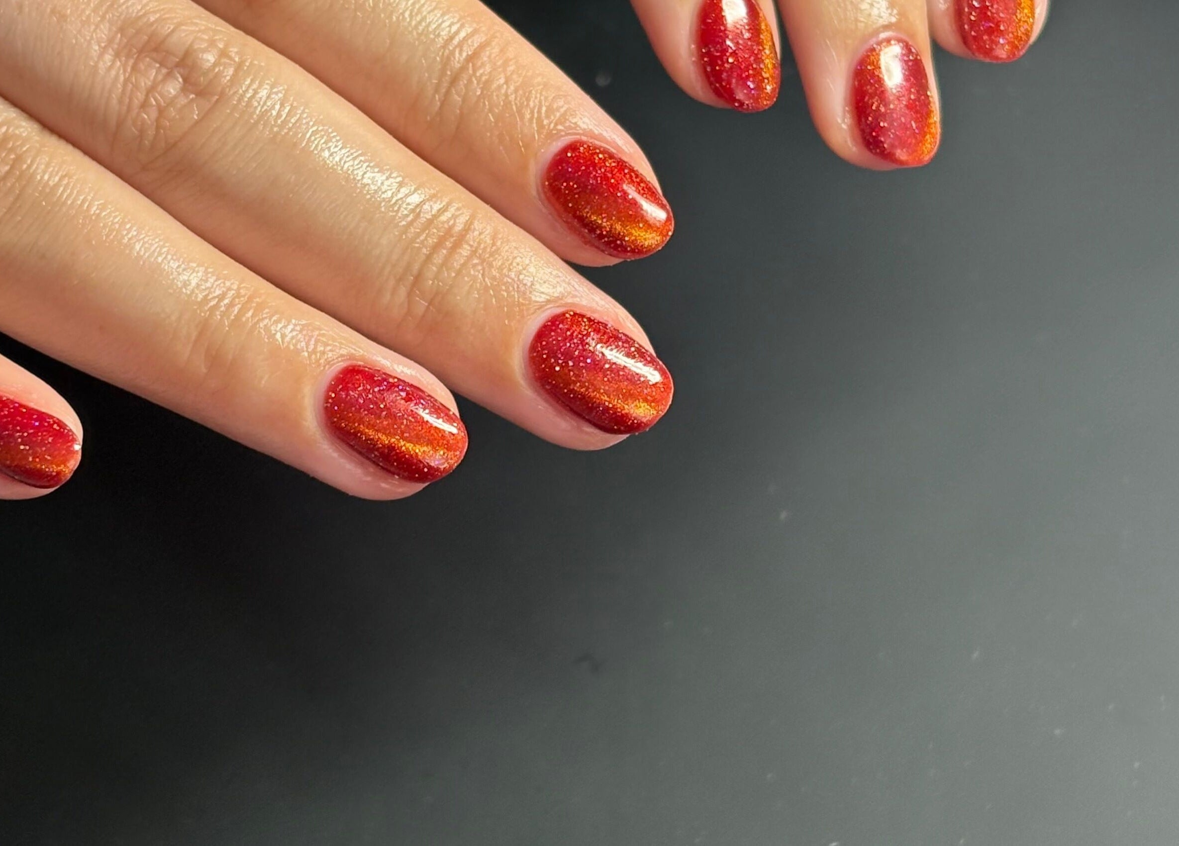 Elegant red and orange glitter nails by Beck’s Nails - Beauty in Gillingham, England, GB.