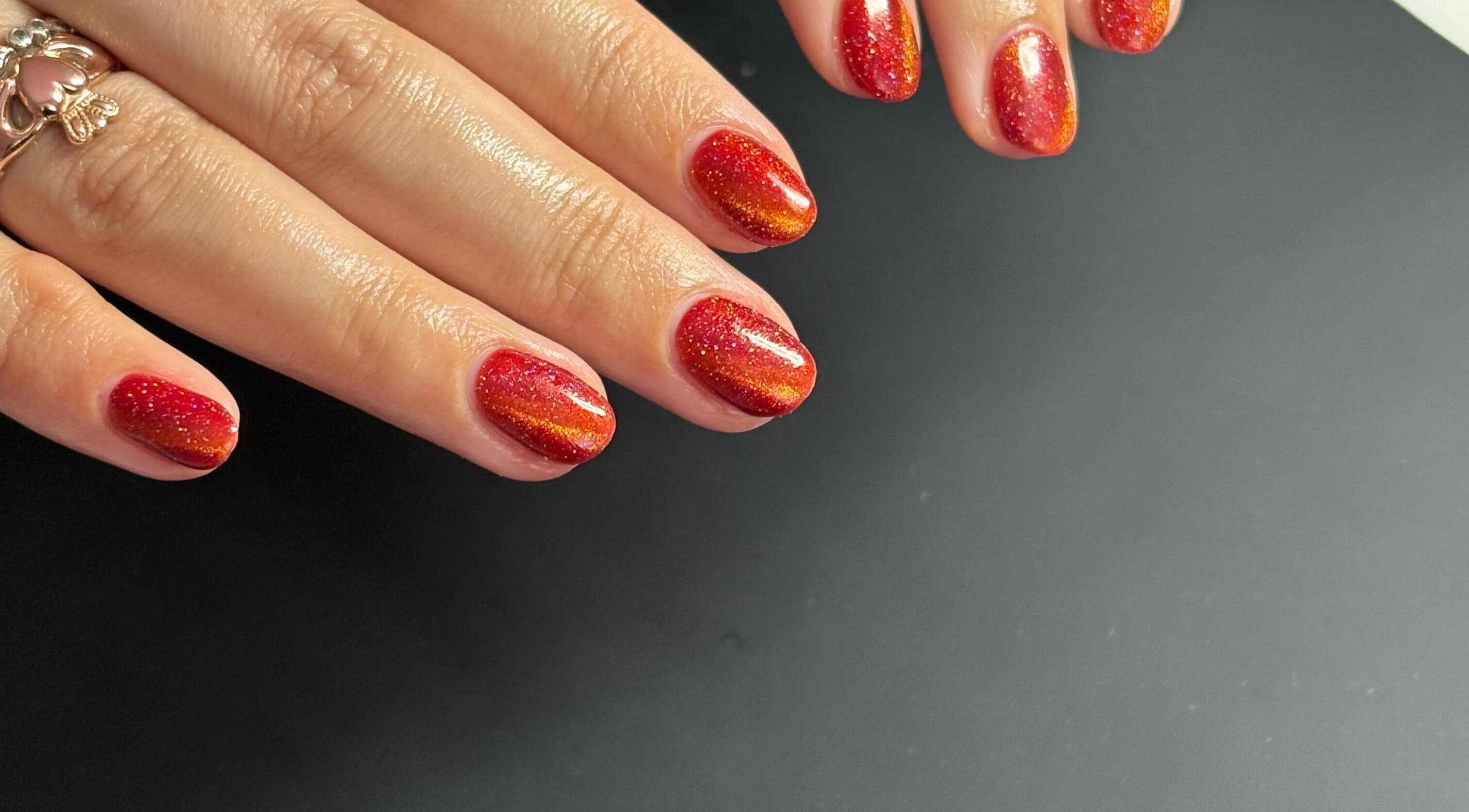 Elegant red and orange glitter nails by Beck’s Nails - Beauty in Gillingham, England, GB.
