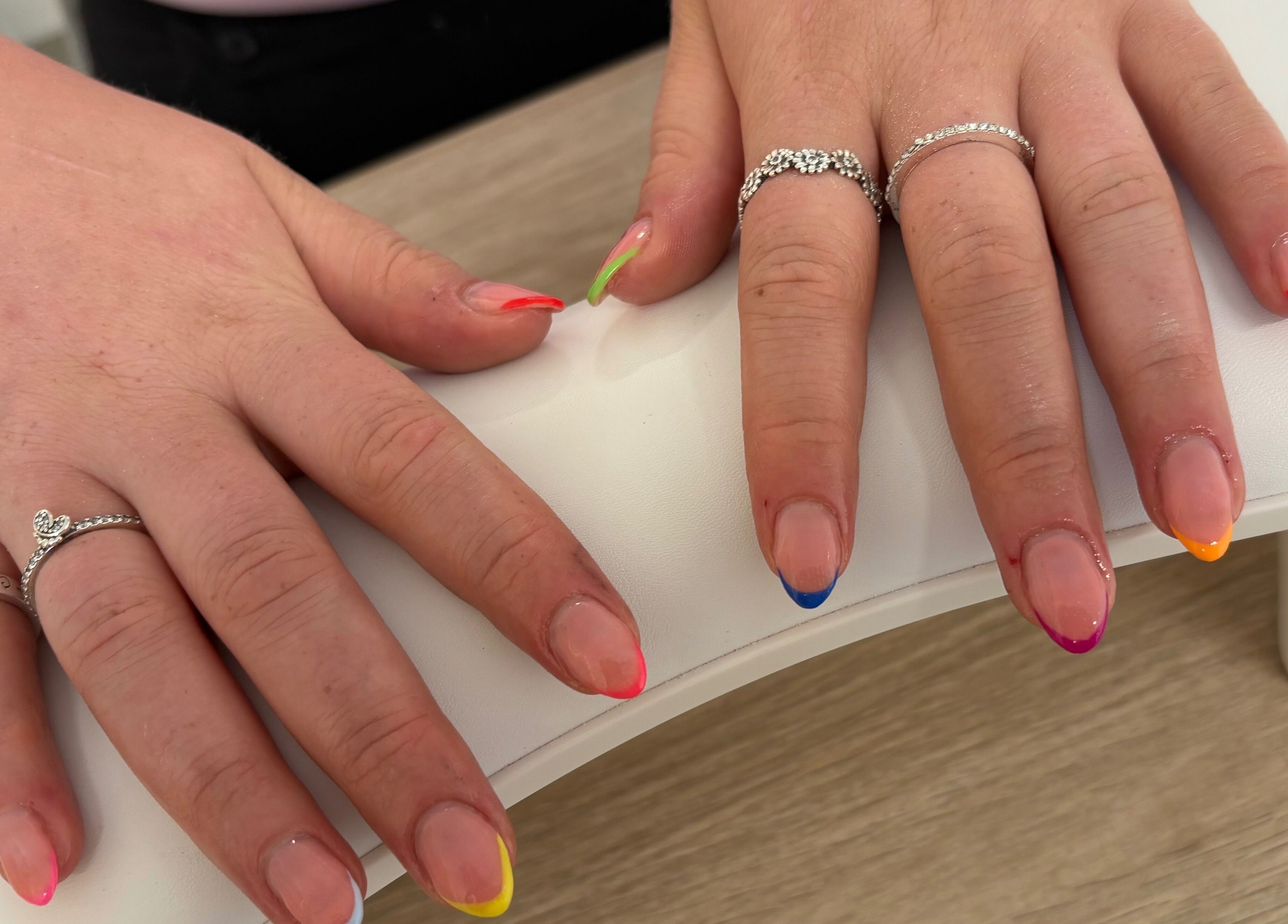 Colorful nail art showcased at Beck’s Nails - Beauty, Gillingham, England, GB.