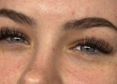Close-up of styled eyelashes from LSCOSMETICS, Manchester, England, GB. Enhancing natural beauty.
