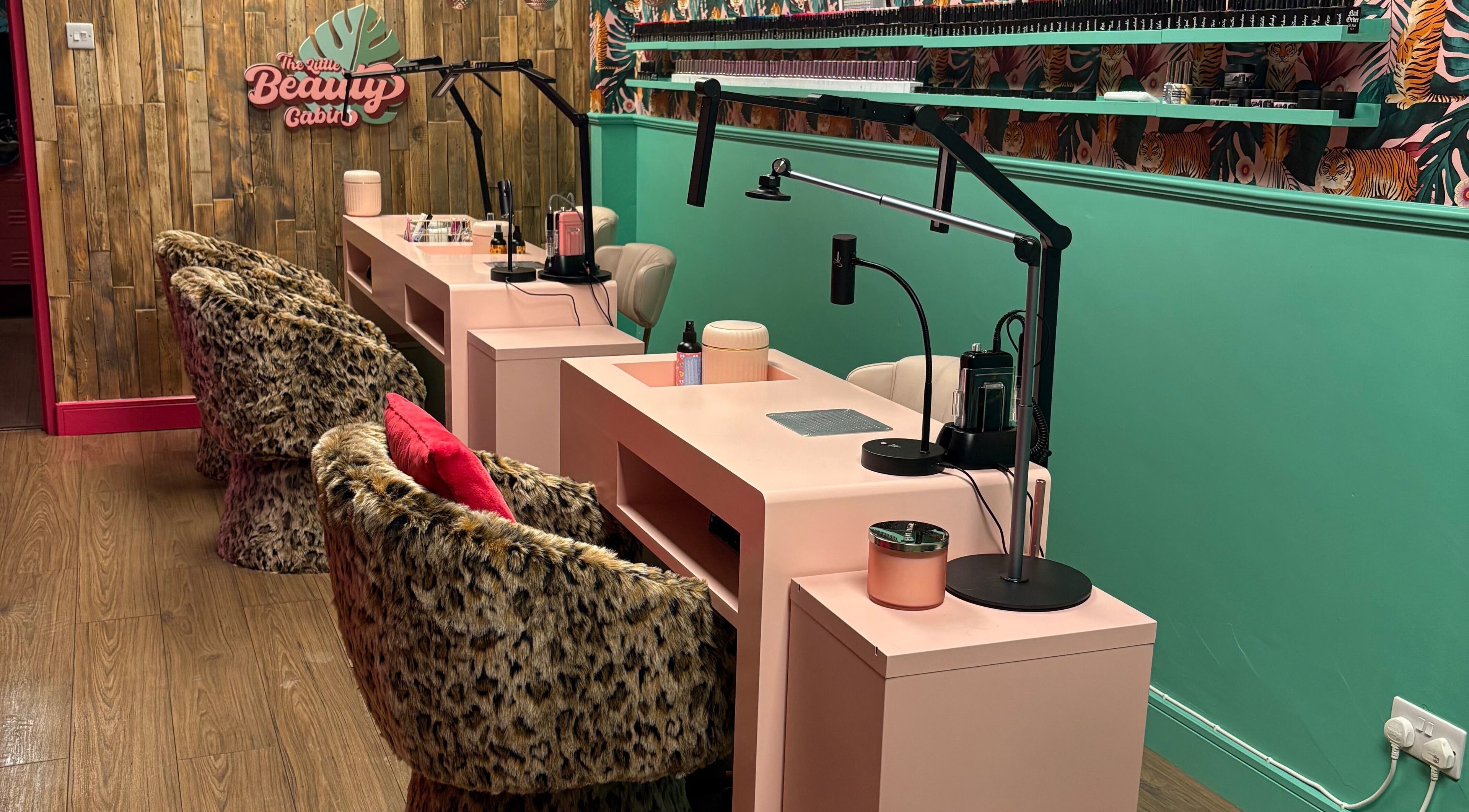 Chic nail station at The Little Beauty Cabin, Hadston, England, GB featuring stylish leopard-print chairs.