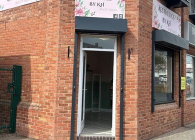 Entrance of Aceso Aesthetics in Northwich, England, GB, showcasing brick exterior and welcoming doorway.