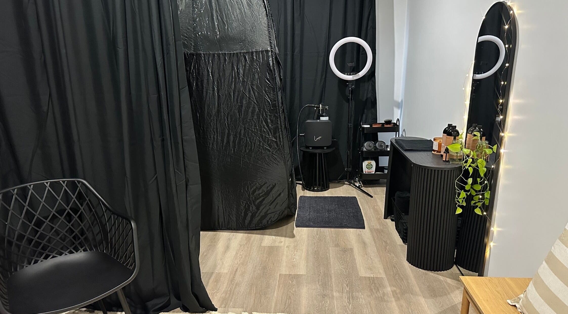 Elegant tanning area at Honey Tans, Cleveland, Queensland, AU, featuring modern decor and professional equipment.