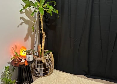 Relaxing corner at Honey Tans, Cleveland, Queensland with plants and salt lamp ambiance.