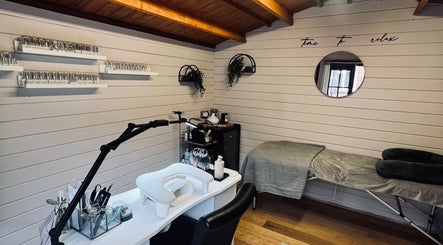 Relaxing spa setup at Allthingsbeauty_bykatiex in Pershore, England, GB featuring a manicure station and massage bed.