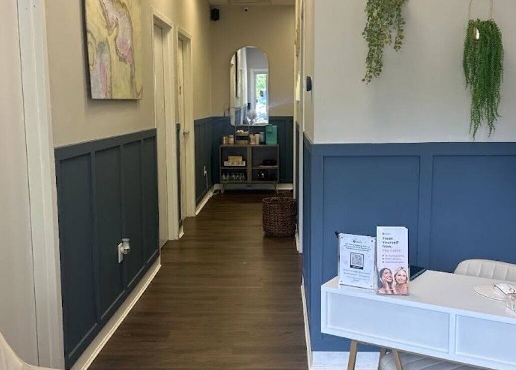 Elegant hallway at Bare Face Esthetics in Cheshire, Connecticut, US, featuring modern decor and serene ambiance.