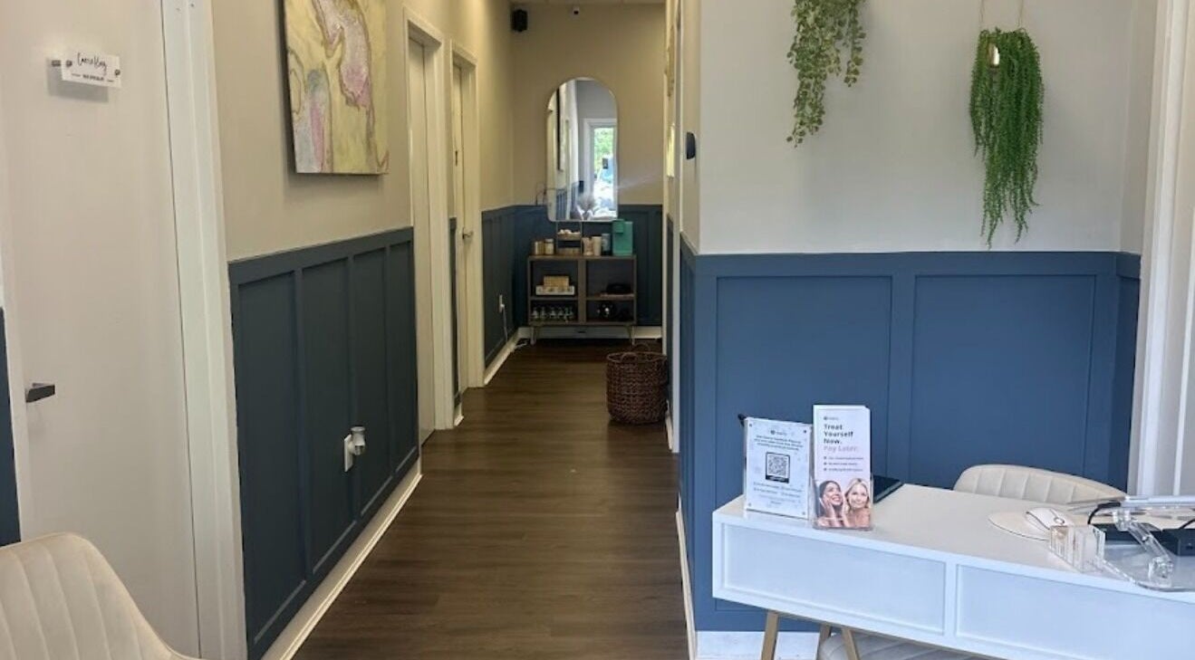 Elegant hallway at Bare Face Esthetics in Cheshire, Connecticut, US, featuring modern decor and serene ambiance.