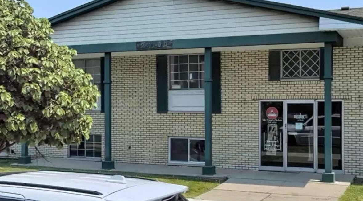 Front view of Naturally Auinye, a wellness venue in Eastpointe, Michigan, US with brick exterior and greenery.