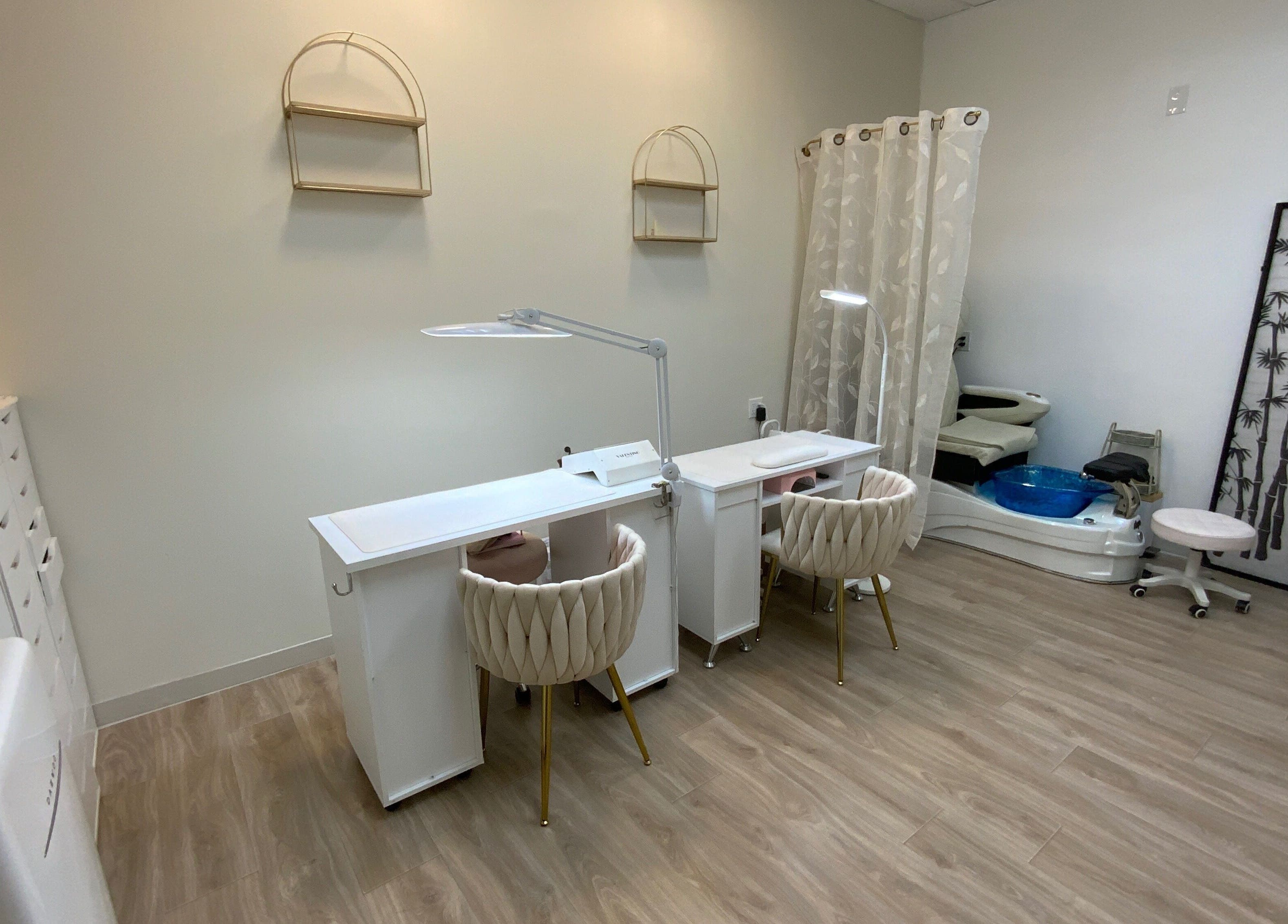 Cozy nail salon at Ruby's Nailz and Lashes, Boca Raton, Florida, US with chic nail stations and pedicure area.