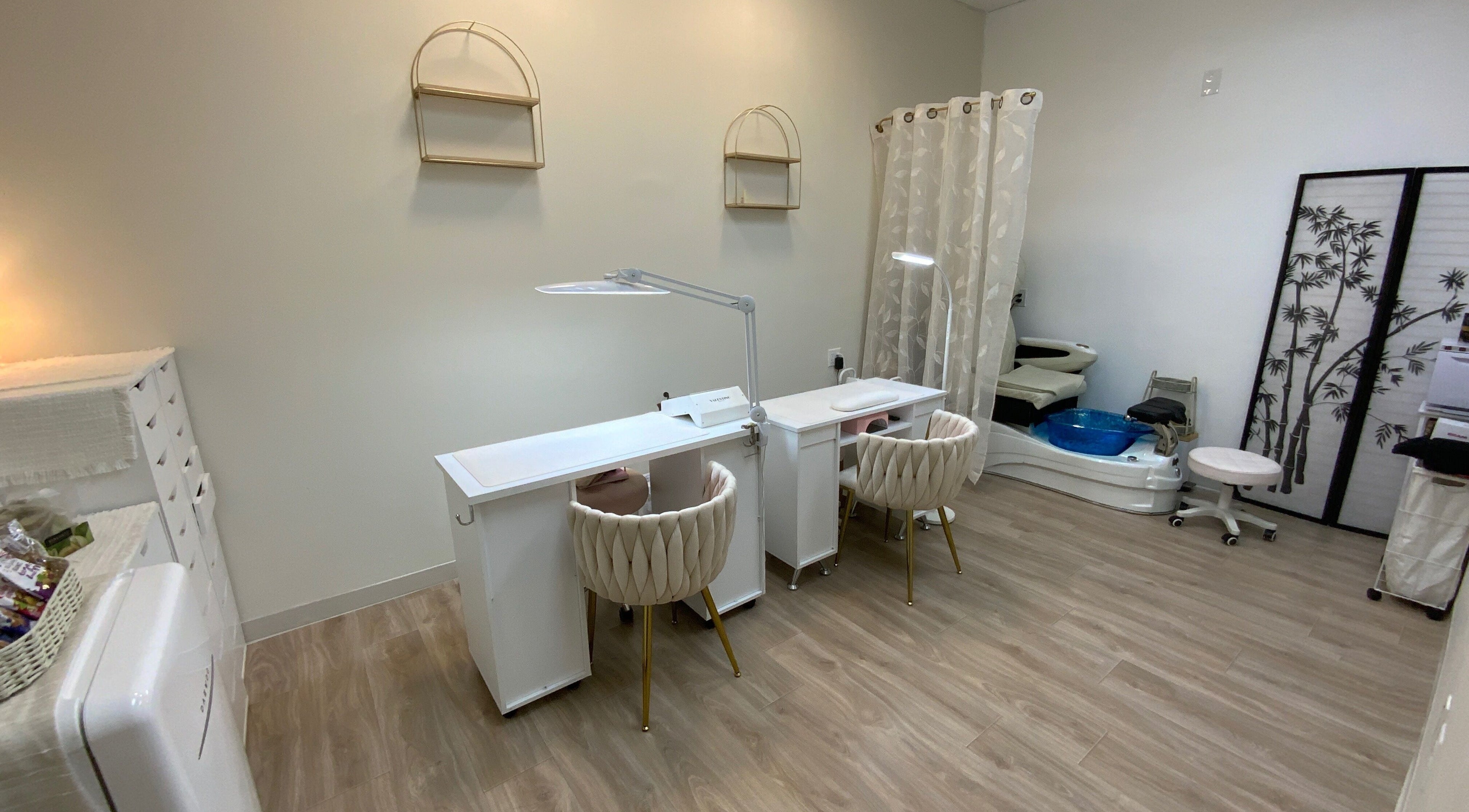 Cozy nail salon at Ruby's Nailz and Lashes, Boca Raton, Florida, US with chic nail stations and pedicure area.