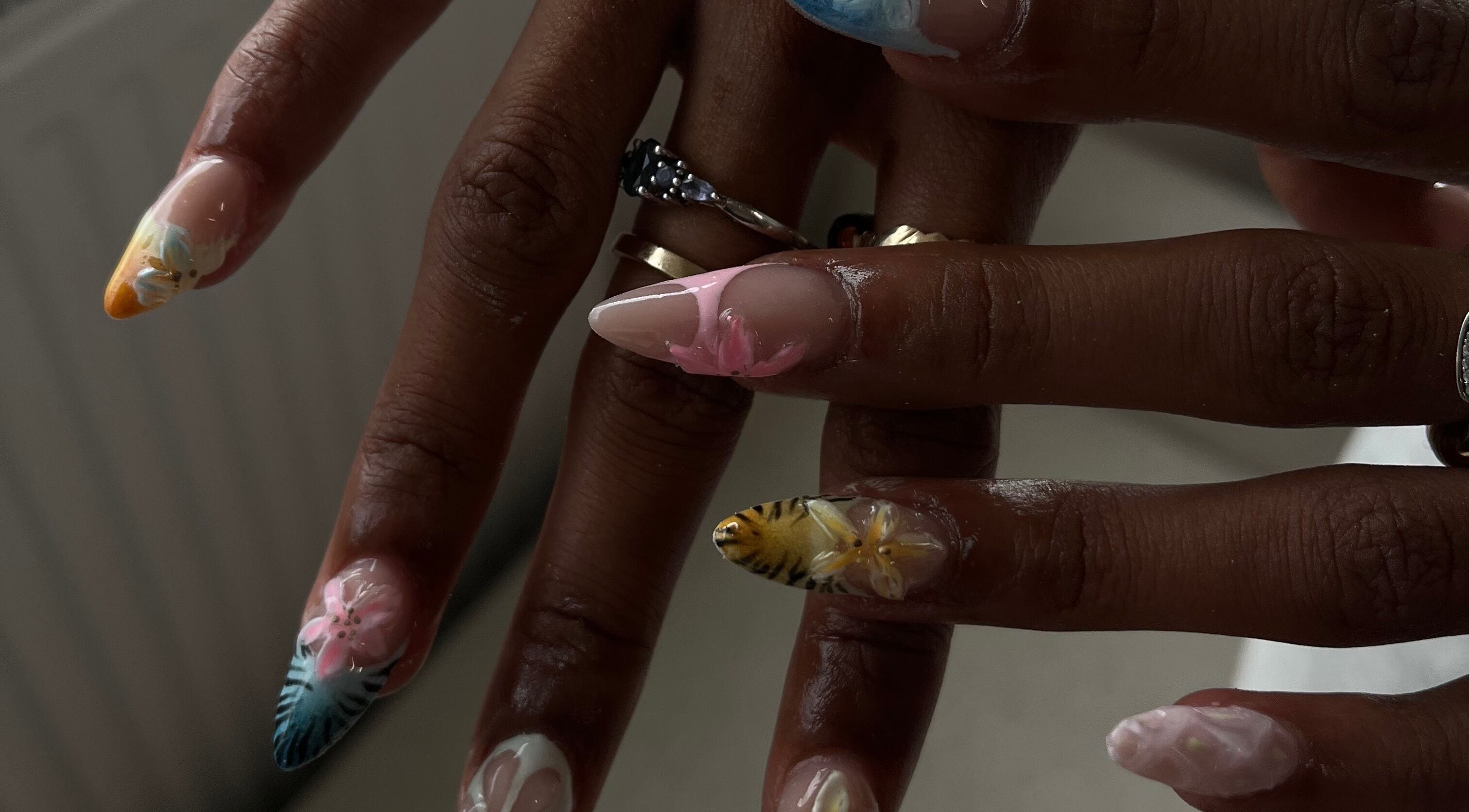Intricate nail art at Nails By Wik in Doncaster, England, GB, showcasing vibrant floral designs.