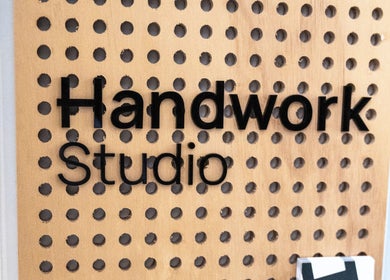 Handwork Studio wooden sign in Melbourne, Victoria, AU with artistic design.