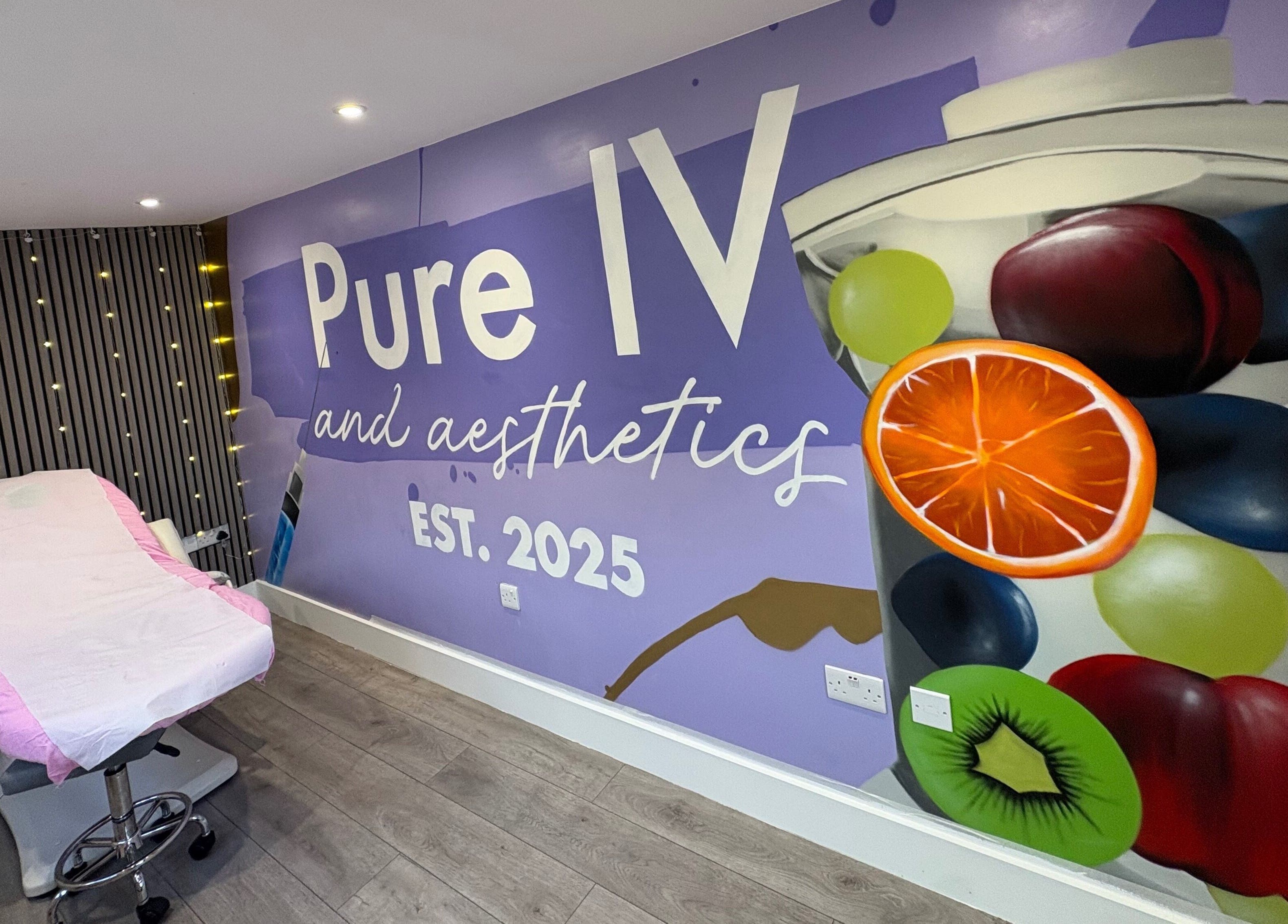 Interior view of Pure IV and Aesthetics with vibrant wall art in Sarisbury Green, England, GB.