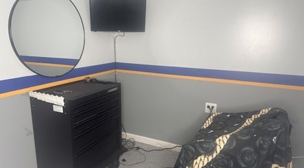 Contemporary barber station at Daniel M Barbershop in Ashland, Massachusetts, US featuring sleek decor.