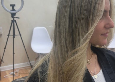 Blonde hair styling at Hairbystellalalo in Long Branch, New Jersey, US. Sleek and elegant look.