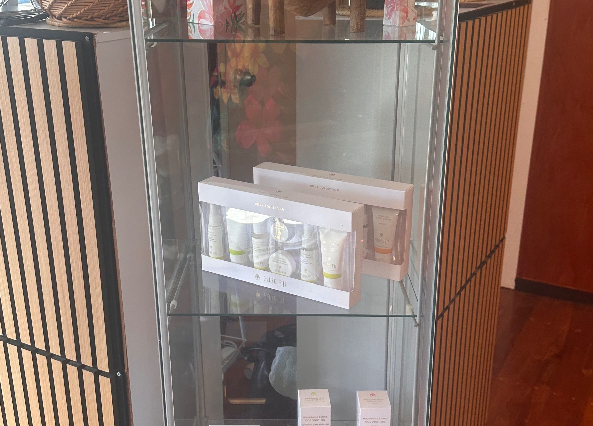 Skincare products showcased in a glass cabinet at Waipu Treatment Room, Waipu, Northland Region, NZ.