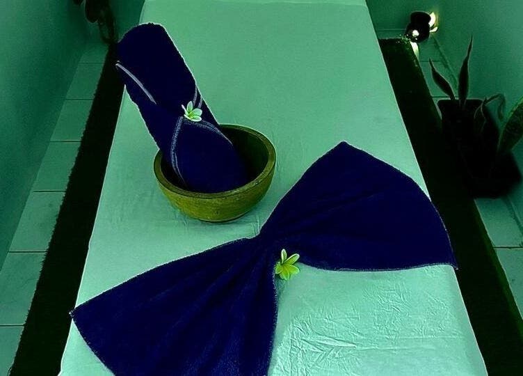 Relaxing massage table with elegant towel arrangement at D' Paradise SPA in Bali, Bali, ID.