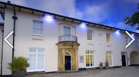 Front view of Mol Thai Therapy in Doncaster, England, showcasing its elegant exterior design.