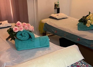 Luxury massage beds with roses at Magic Touch Thai Massage, The Rocks, New South Wales, AU.