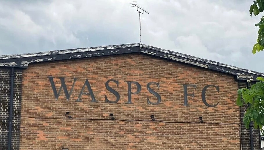 Wasps FC building facade near MH Sports Massage, London, England, GB.