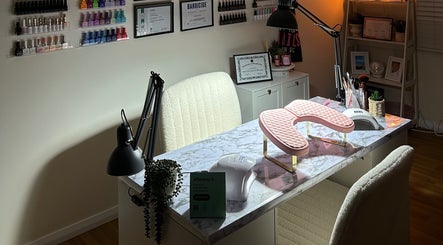 Elegant nail station at Dollhaven_co in Walmsley, Western Australia, AU, featuring modern decor and tools.