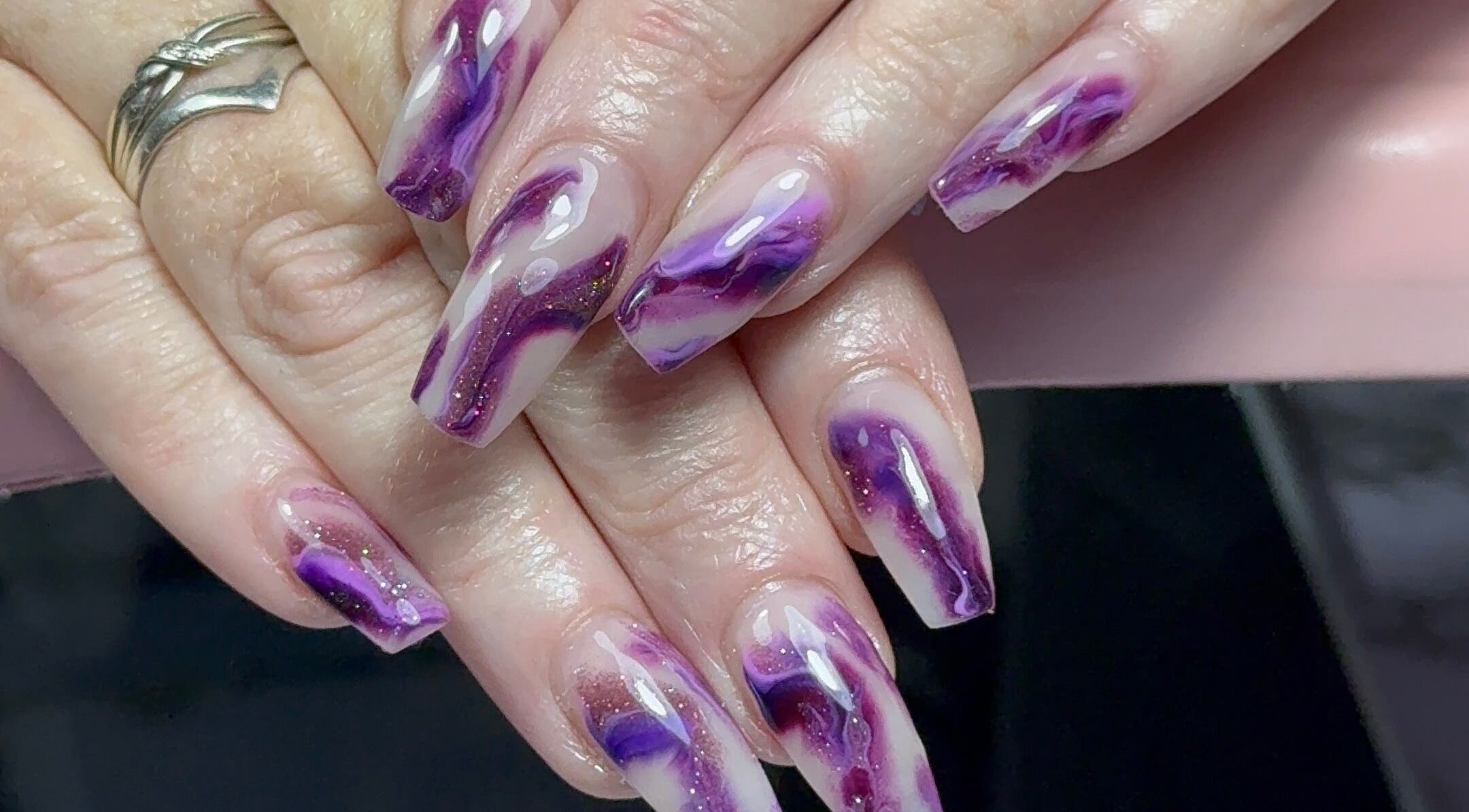 Vibrant purple nail art at Dollhaven Co, Walmsley, Western Australia, AU.